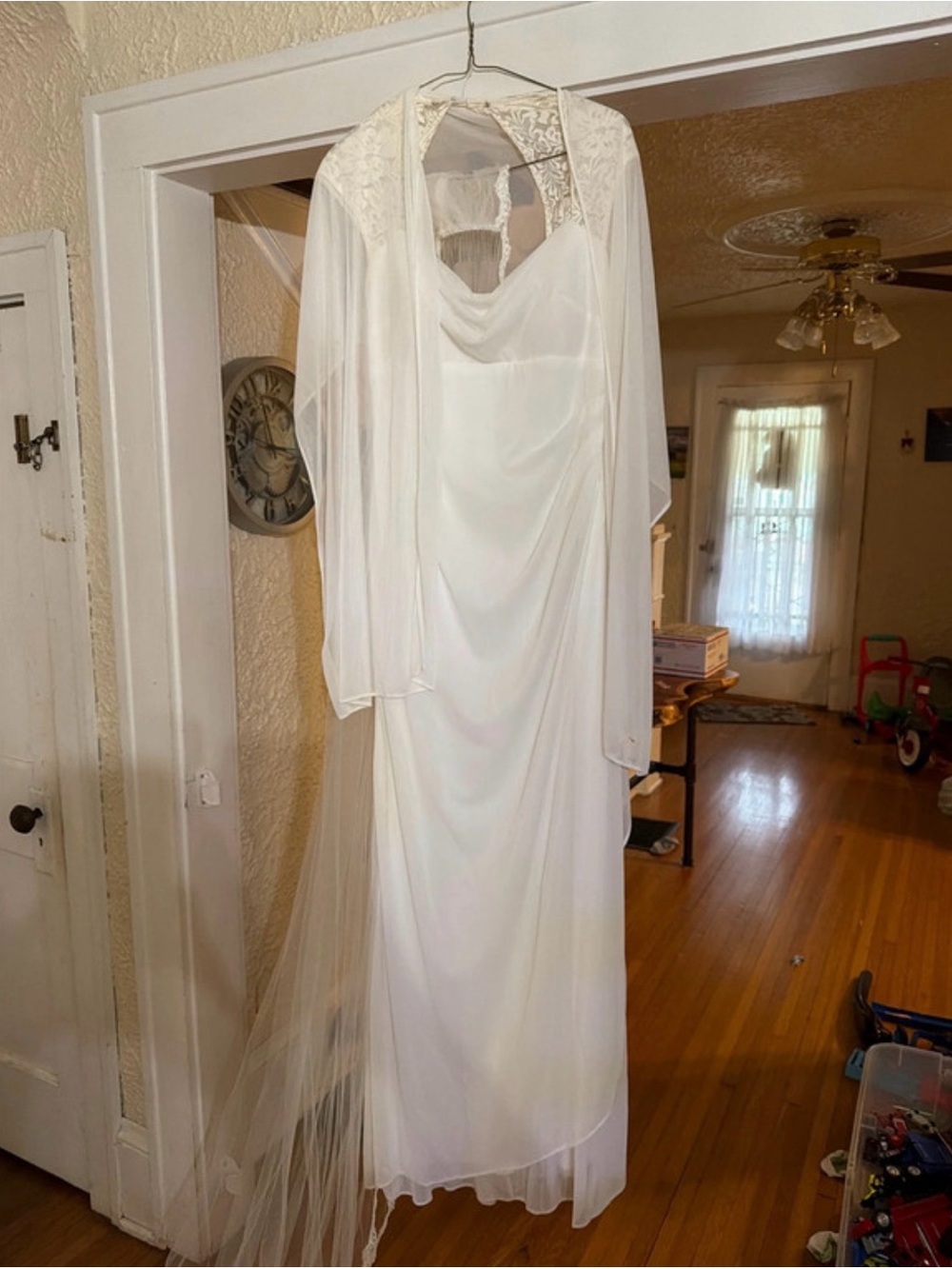 Size 8 wedding dress with 8 ft veil, strapless bra slip and dress bag